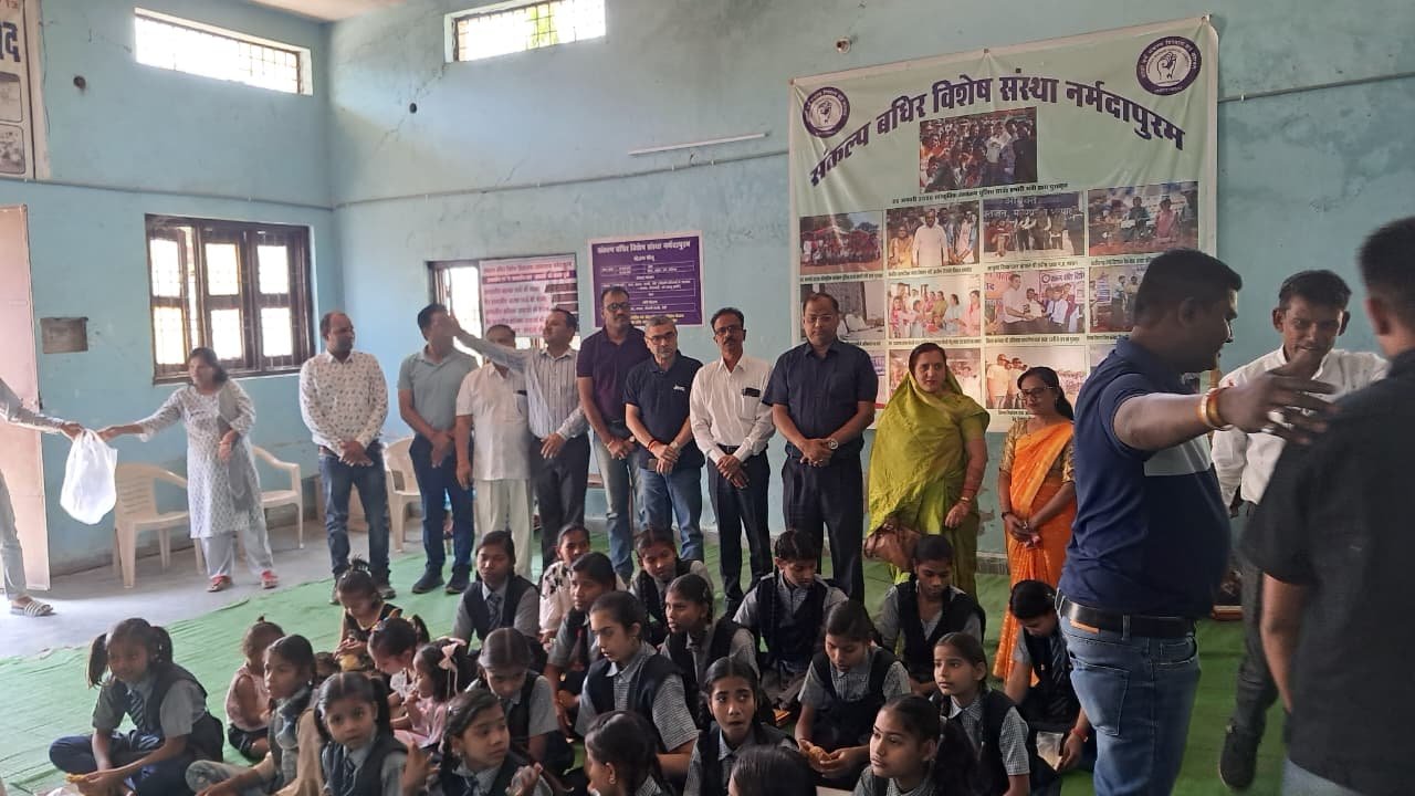 Teacher helping a child with activity